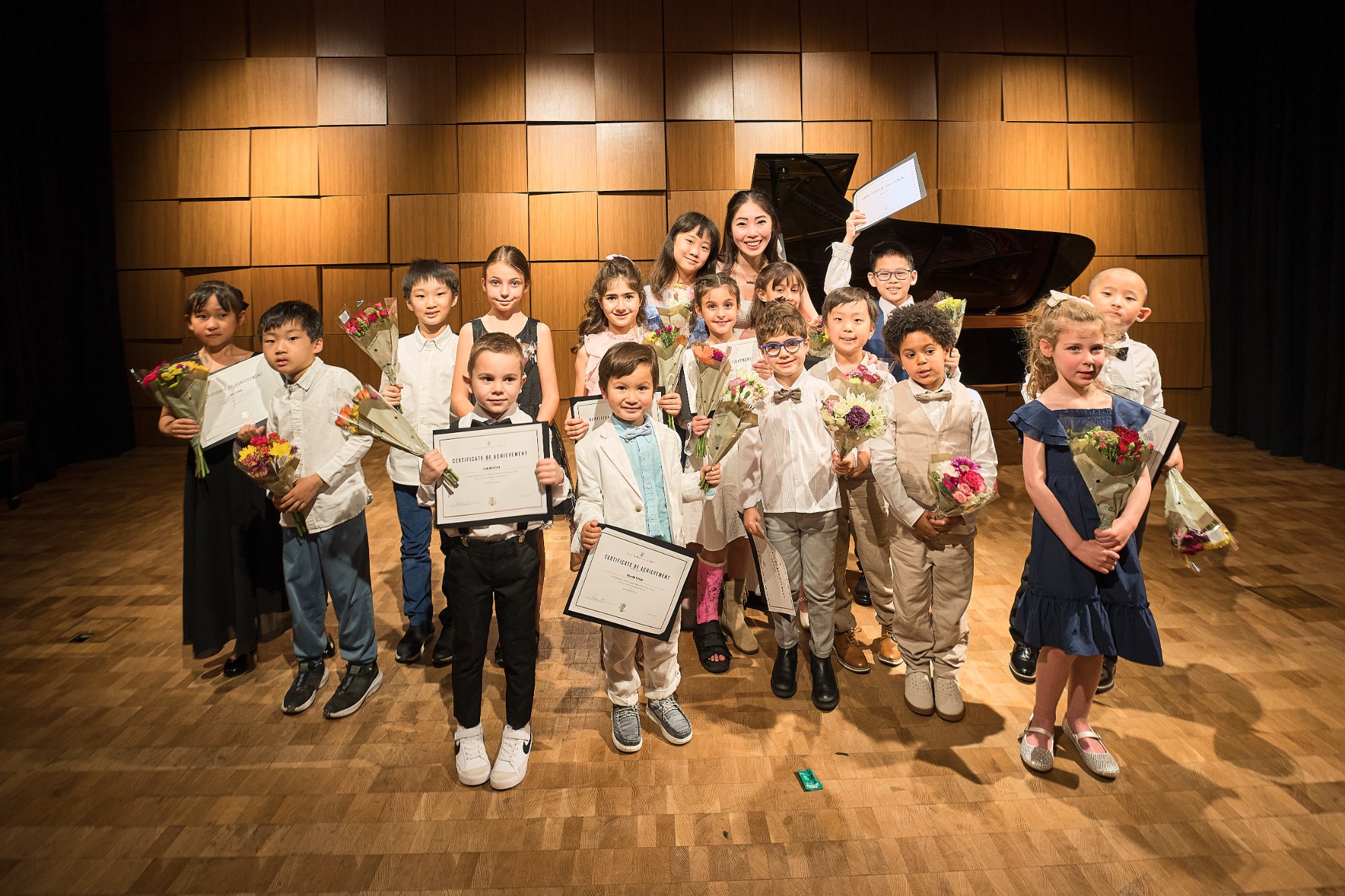 Cristina Huang with students at recital