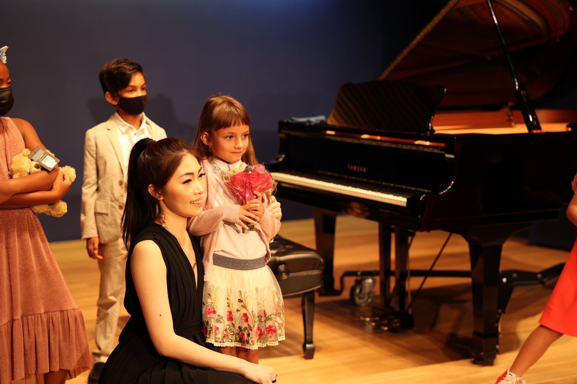 Cristina with students after recital 2021